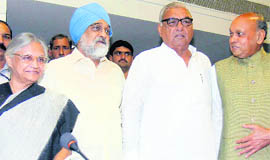 Deputy Chairman of the Planning Commission Montek Singh Ahluwalia (2nd from L) along with Chief Ministers Sheila Dikshit (Delhi), Bhupinder Singh Hooda (Haryana) and Prem Kumar Dhumal (Himachal Pradesh) during a regional-level consultation meeting in New Delhi 