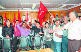 Activists of the CPM demonstrate against DLF construction, at the forest office in Shimla 