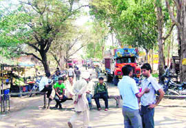 The Nalagarh-Swarghat road being blocked by villagers
