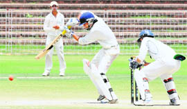 Caught in action A palyer of the Chandigarh team hits a shot during their match against Bathinda at the Sector 16 Cricket Stadium in Chandigarh on Tuesday.