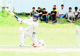 A batsman in action in the All-India Uttarakhand Gold Cup Cricket Tournament played at the Rangers College ground in Dehradun on Tuesday.