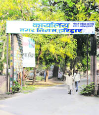 The signboard at the entry gate of the newly formed Municipal Corporation in Haridwar.