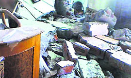 Debris lies scattered following a blast in a house at Yamunanagar on Tuesday.