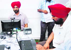 Deputy Commissioner KS Pannu gets himself registered for the unique identification number in Amritsar on Tuesday