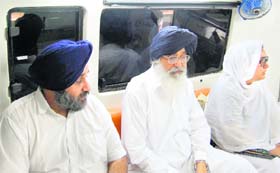 Chief Minister Parkash Singh Badal and Deputy CM Sukhbir Badal outside the PGI in Chandigarh on Tuesday