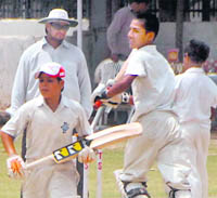 A cricket match between DP Azad Cricket Academy and GNPS Cricket Academy, Sector 36, being played at Banyan Tree School in Sector 48, Chandigarh, on Wednesday