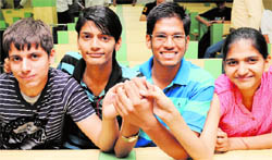 Sumegha Garg (rank 12), Gautam Jain (rank 20), Rhythm Gupta (rank 27) and Piyush Sharma (rank 30), who did well in the IIT examination, pose in Chandigarh on Wednesday