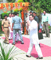 Rahul Gandhi greets workers during his visit to Rishikesh 