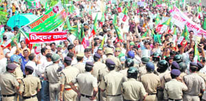 Workers of the UKD (Diwakar Bhatt faction) are prevented by the police from moving towards Raj Bhawan in Dehradun 