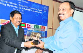 Dr AK Srivastava, NDRI Director, presents a memento to Dr Abul Kalam Azad (right), Director, SAARC Agriculture Centre, Bangladesh, during a consultation meeting at the NDRI in Karnal on Wednesday