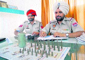 Police displays the live cartridges Ramgarh Chowki on Wednesday
