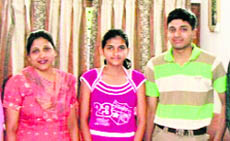 Sumegha Garg with her mother and brother.