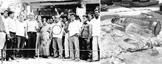 Shopkeepers raise slogans against the HUDA enforcement staff for damaging goods at the booth of Sangita Rani (encircled); (and right) a cold drink bottlethat was allegedly broken by the anti-encroachment team in the market of Sector 9, Panchkula.