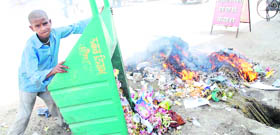 Robbed of childhood A child works for the Municipal Corporation in front of TB Hospital in Patiala on Tuesday.