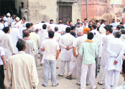 The body of Manjit Singh, co-pilot of the air ambulance that crashed in Faridabad, being taken for cremation in Shahpur village of Sonepat district in Haryana on Thursday.