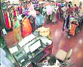 A CCTV grab shows suspects making a quick exit from a boutique in Ludhiana