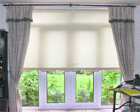 SHEER MAGIC: A layered window treatment is for all seasons
