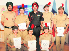 AIMING HIGH NCC cadets pose with Maj-Gen Mohabat Singh in Chandigarh on Friday.