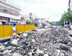 A road dug to lay water pipes, creating problems for residents in Dehradun