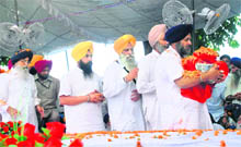 CM Parkash Singh Badal and Sukhbir Badal (with the urn) at Gurdwara Patalpuri Sahib in Kiratpur Sahib on Friday.