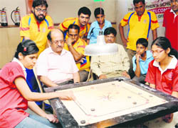 Players in action at the 11th North Zone Carrom Championship at St Stephens School, Sector 45, Chandigarh, on Saturday