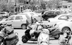 Vehicles parked haphazardly at Phase VII in Mohali