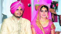 Cricketer Reetinder Singh Sodhi with his wife Prabhdeep Kaur after their marriage in Ludhiana on Saturday. 