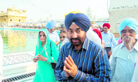 West Bengal Tourism Minister Rachpal Singh at the Golden Temple in Amritsar on Saturday.