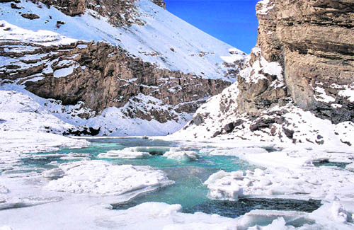 A gurgling Zanskar River which freezes completely in winter 