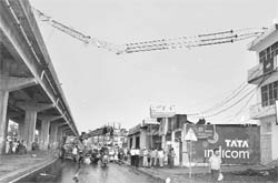  A view of the mobile tower that fell on the flyover connecting the Chandigarh-Ambala National Highway.