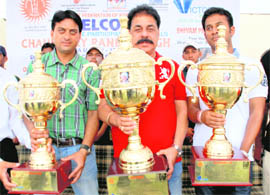 Organisers show the trophies that will be given to the winners of the 13th All-India U-17 National Day/Night League Cricket Championship to be held from June 2, Panchkula. 