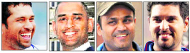 (L-R) Sachin Tendulkar, Mahendra Singh Dhoni, Virender Sehwag.