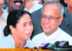 West Bengal's CM Mamata Banerjee with Union Finance Minister Pranab Mukherjee in Kolkata on Sunday