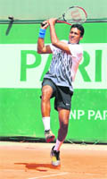 Bhupathi in action in the mixed doubles in Paris on Sunday.  AFP