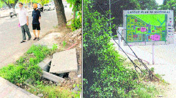A view of an open gully ; and (above) the layout plan on a pavement poses threat to the life of residents at Sector 41 in Chandigarh