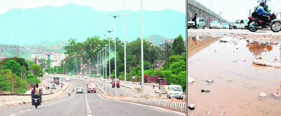 While the traffic moves smoothly on the Zirakpur-Pinjore overbridge, things are not quite the same underneath, as motorists have to negotiate potholes and puddles near the road separating Sectors 12 and 4, Panchkula