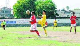 Players in action in a match of the Lala Nemi Dass Memorial Dehradun District Football League in Dehradun on Monday