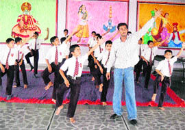 Students learn dance during a summer camp in their school at Kharakheri in Fatehabad. 