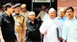 (From left) Members of Lokpal Bill committee, Santosh Hegde, Shanti Bhushan, Anna Hazare, Prashant Bhushan and Arvind Kejriwal, after a meeting in New Delhi.