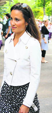 Pippa Middleton, sister of Catherine, Britain's Duchess of Cambridge, leaves the central court during the French Open tennis tournament at the Roland Garros stadium in Paris.