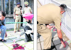 Forensic department employees take sample of blood at the site where Anandi jumped to her death at Bhawan Vidalaya in Sector 27, Chandigarh and (right) A policeman lifts a slipper of the victim