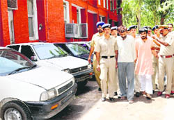 The accused being taken for medical examination from the Mani Majra police station on Wednesday