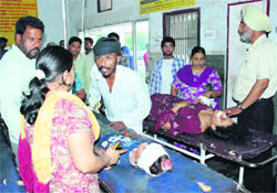 Two of the injured being brought to the General Hospital in Sector 6, Panchkula, for treatment on Wednesday