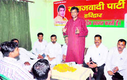 Uttarakhand Samajwadi Party chief Vinod Barthwal addresses party workers in Haridwar on Wednesday