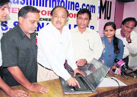SS Anand Lehar, senior advocate of the Supreme Court, launches an informative website during a programme organised by the Nami Dogri Sanstha at the press club in Jammu on Wednesday