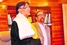 Prof Talat Ahmad (left) takes charge as Vice-Chancellor of the University of Kashmir from Prof Riyaz Punjabi in Srinagar on Wednesday