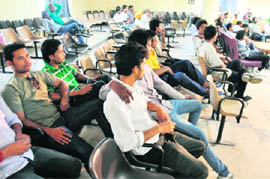 Participants of the singing contest wait in vain for organisers at Punjabi Bhawan in Ludhiana
