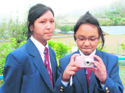 Tsewang and Kunsang try out their new camera on the Army Public School campus in Dagshai 