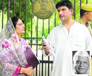 Rohit Shekhar with mother Ujjawala Sharma outside the Delhi High Court in New Delhi on Wednesday; and (inset) ND Tiwari. 