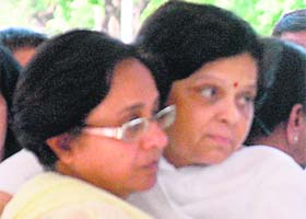 In grief Shashi Gulati (left), mother of Anandi, being consoled by a woman at the cremation ground in Sector 25, Chandigarh, on Thursday